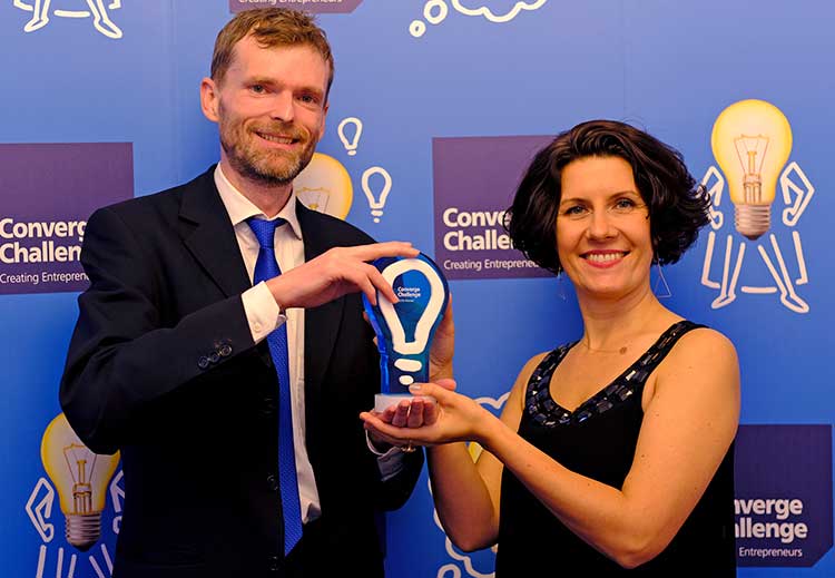 From left - Carbogenic’s Jan Mumme and Lidia Krzynowek with the Converge Challenge trophy