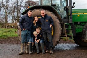 Alison Milne and her family at their farm (photo by Granite Creative)