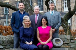 Back left to right - Mike Johnston, Alan Drummond and Darren Thomson Front left to right - Caroline Tice, Sheryl Macaulay